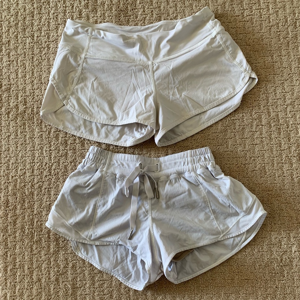 2 pairs of white lululemon shorts